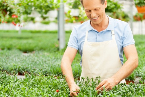 Professional groundwork and base preparation for synthetic turf installation
